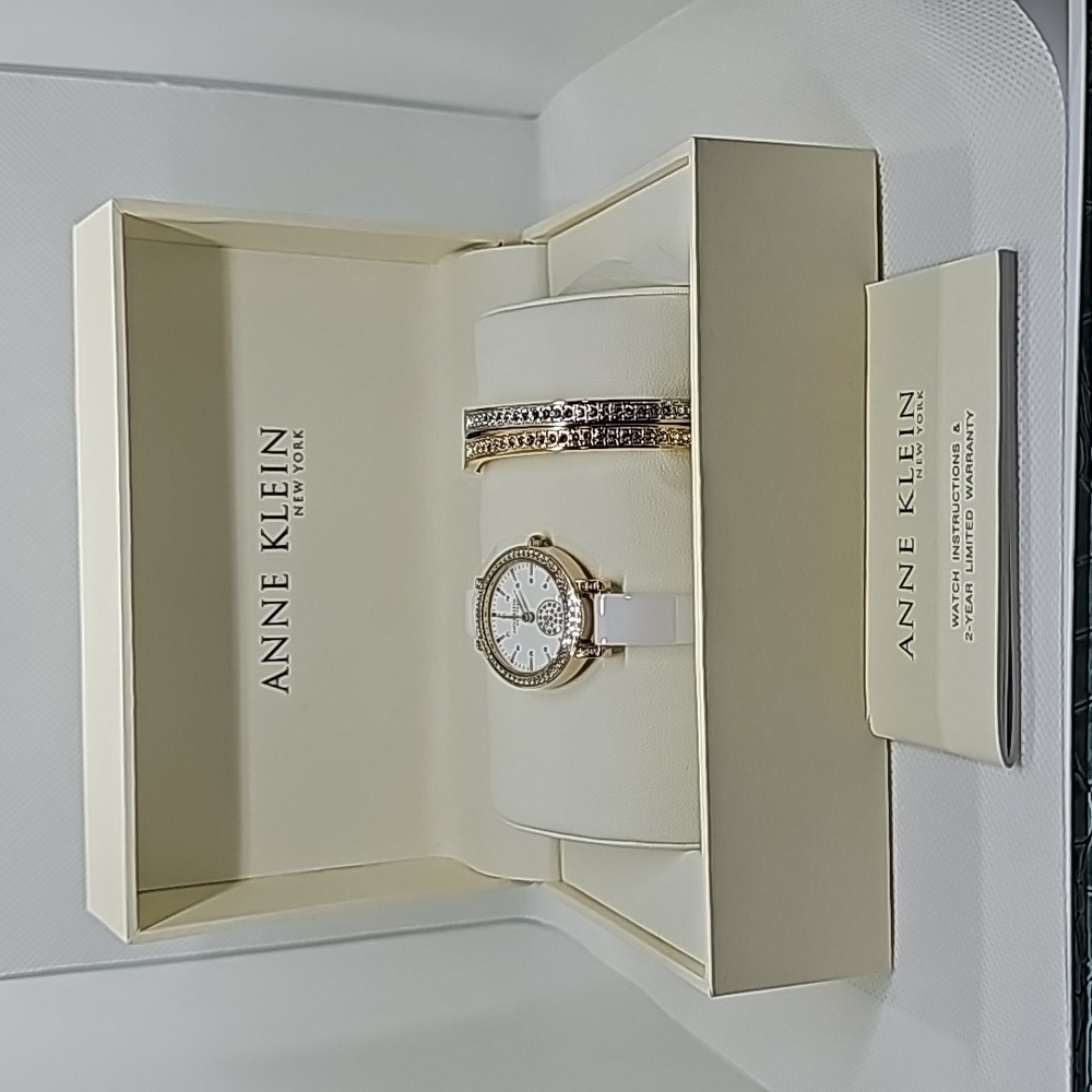 Anne Klein Women's 12/2248WTST Swarovski Crystal Accented White Bangle Watch